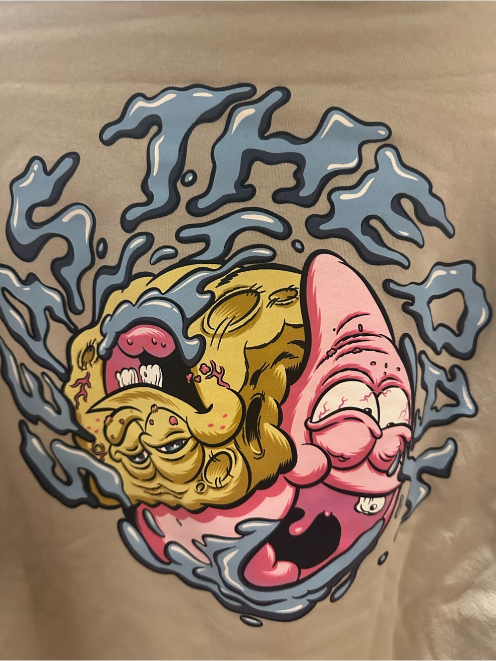 Graphic Cartoon Face Tee in Pink, Yellow, Blue